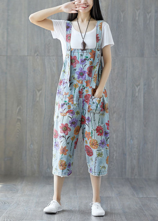 Edler hellblauer Denim-Jumpsuit mit Blumenmuster und Taschen