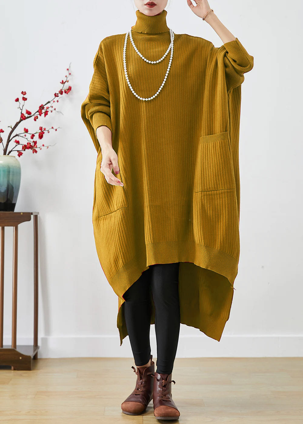 Blaues Oversize-Strickpulloverkleid mit Rollkragen und asymmetrischen Fledermausärmeln