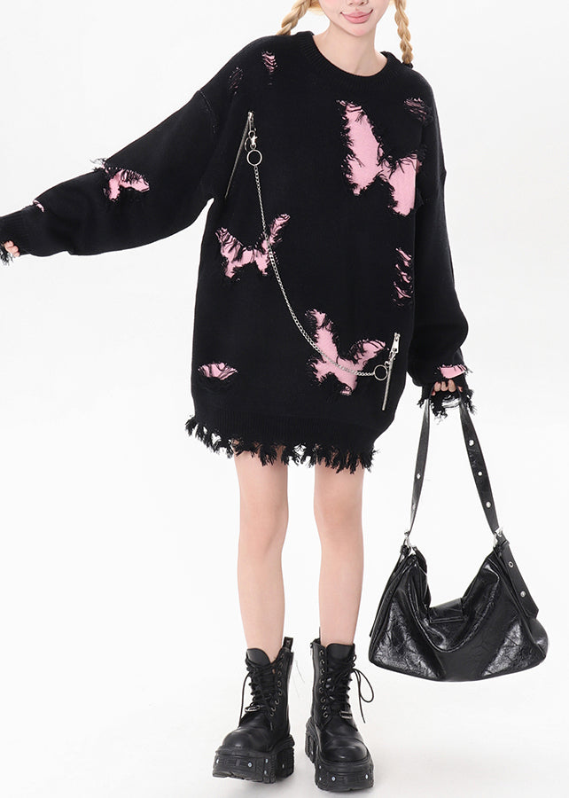 Schwarzer Strickpullover mit Schmetterlingslöchern und Kettenmuster für den Winter