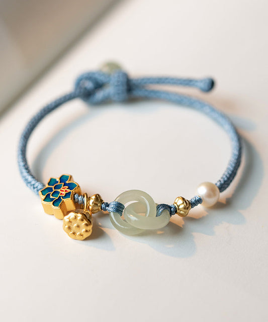 Pulsera de cadena de loto con perla y hebilla de ping con cobre dorado y tejido a mano en azul artístico