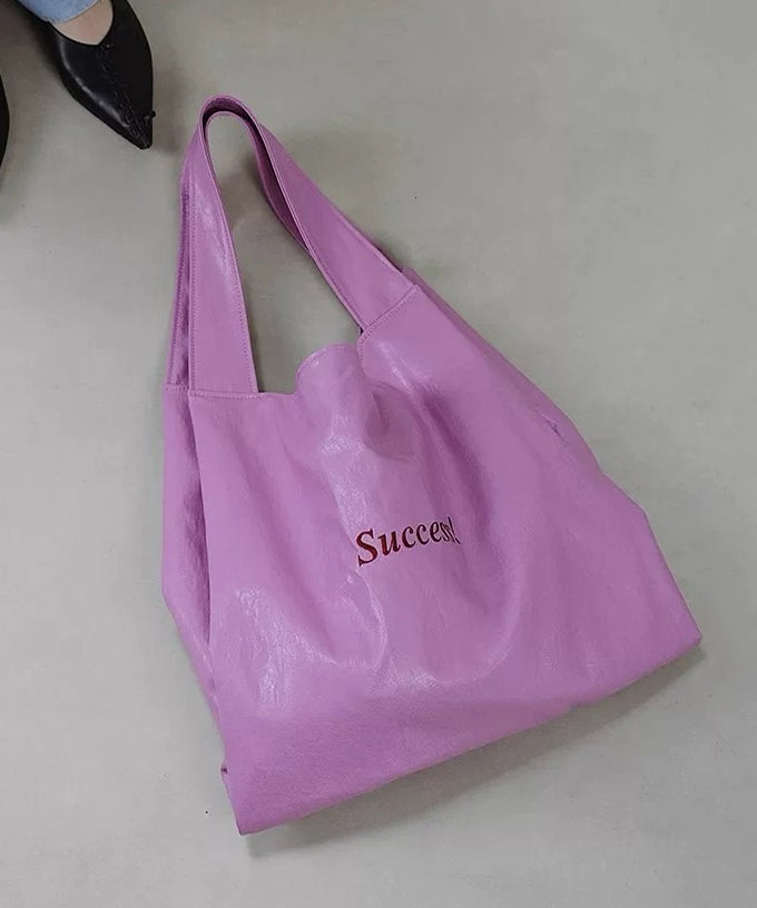 Bolso de hombro de piel sintética de gran capacidad con letras rojas artísticas