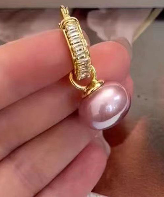 Hermosos aretes colgantes de perla y circonita de aleación de cobre y oro