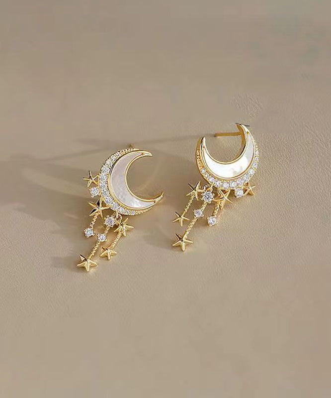 Hermosos aretes colgantes de luna y estrella con circonitas doradas en plata esterlina