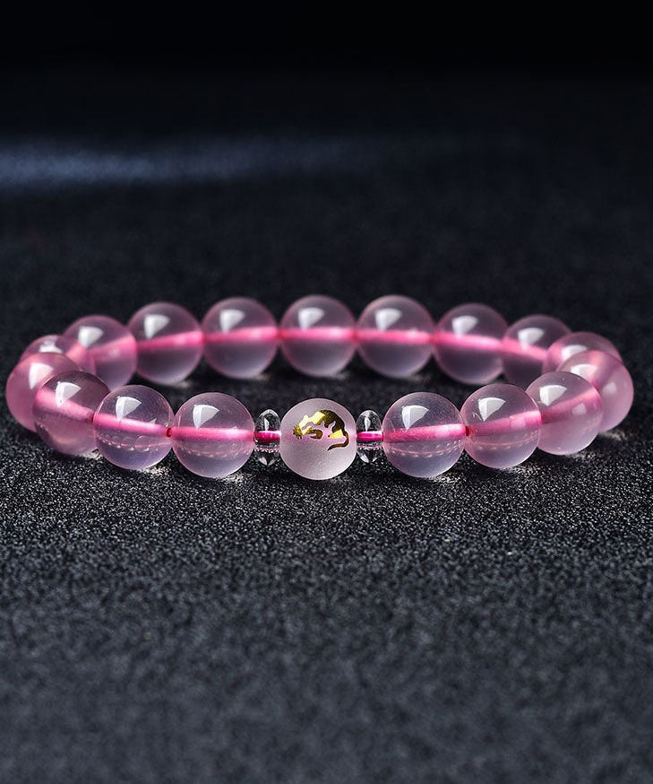 Hermosa pulsera de cristal rosa con los doce signos del zodiaco chino