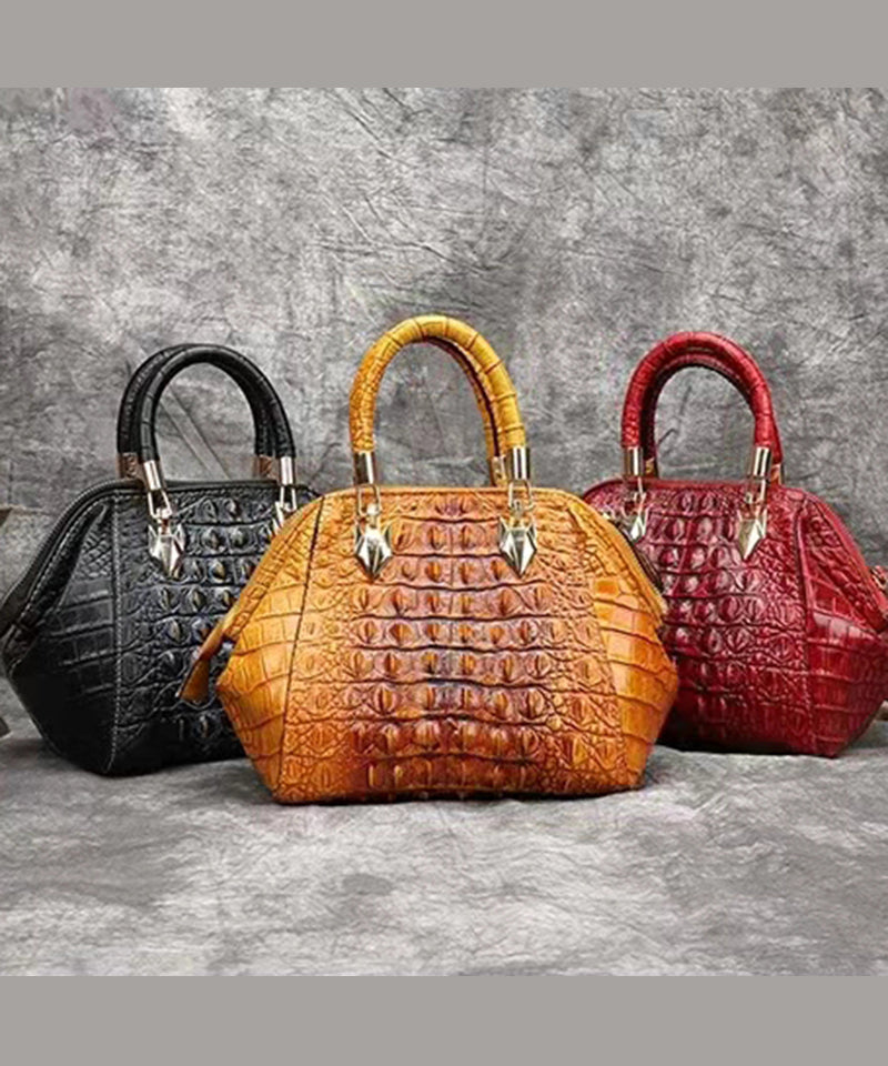 Schöne gelbe Handtasche aus Kalbsleder mit Krokodilmuster