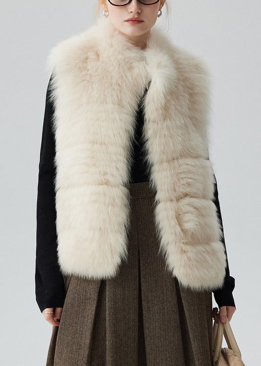 Beige Weste aus robustem Leder und Pelz mit Taschen für den Winter