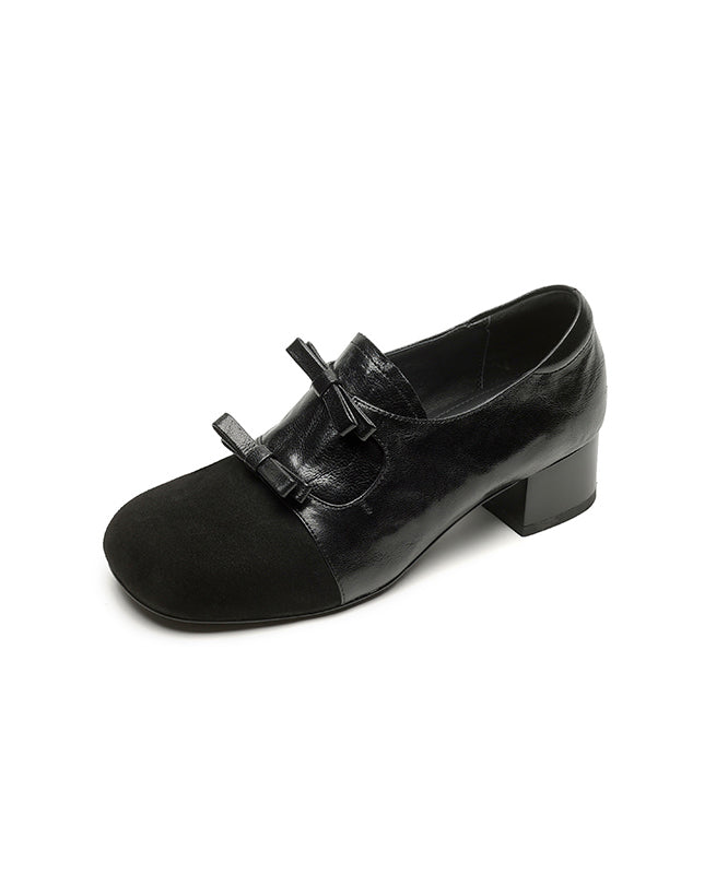 Schwarze, klobige High Heels aus Schaffell mit Wildleder-Schleife