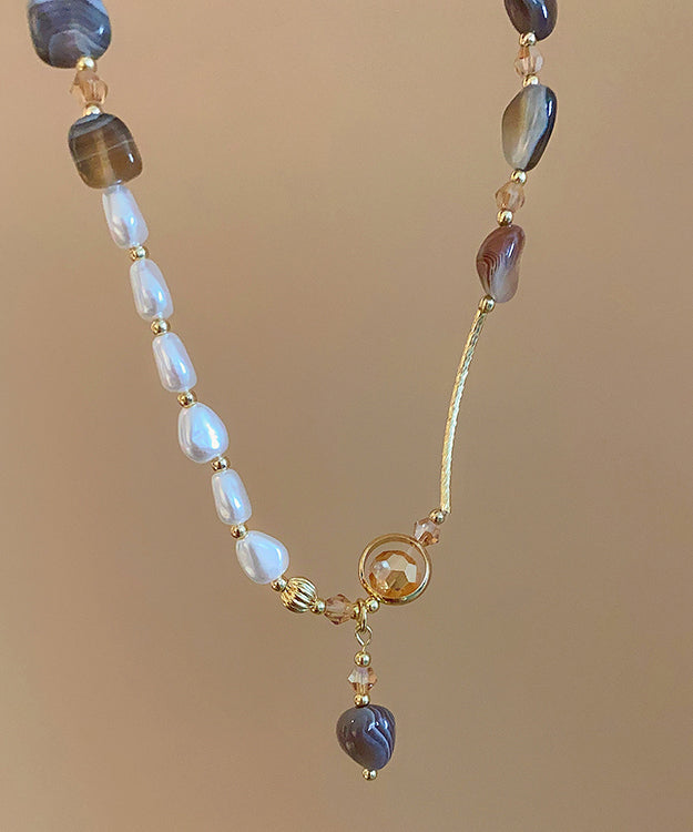 Pulsera Bohemia con múltiples cuentas de cobre dorado y perla de cristal