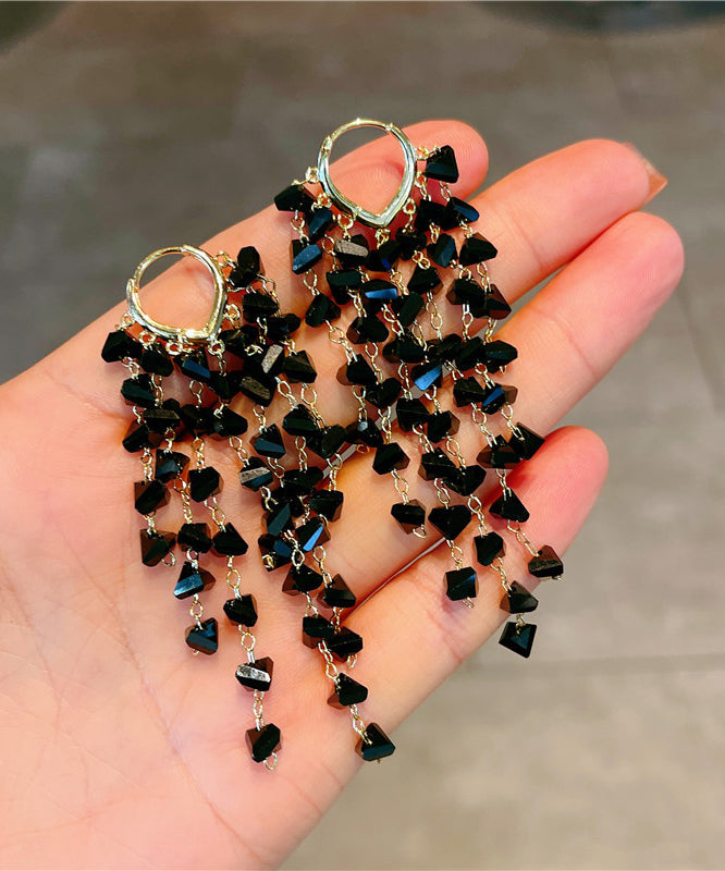 Pendientes bohemios con borlas de amor y cristales dorados en plata de ley negra