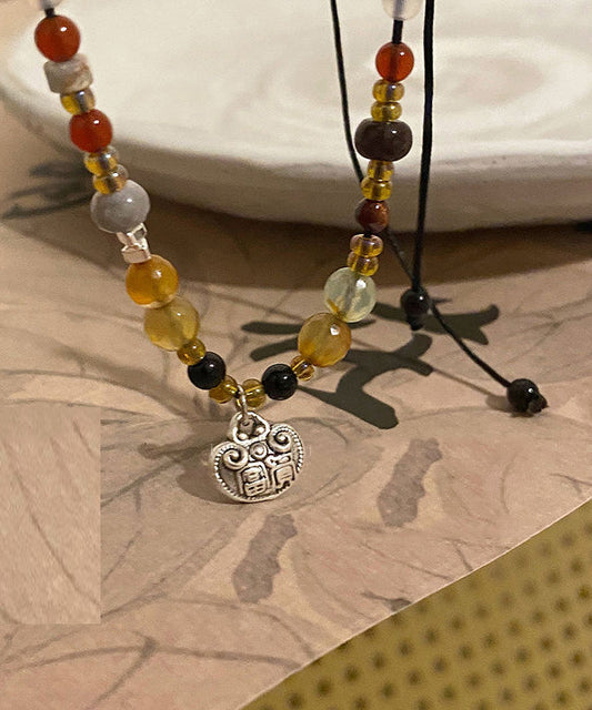 Collar bohemio con colgante de ágata y perla de cobre