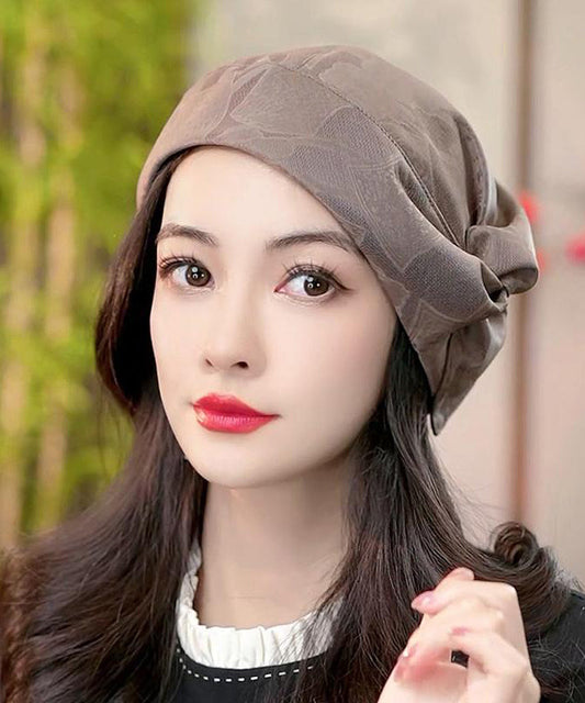 Boina de seda arrugada con estampado negro de Boutique