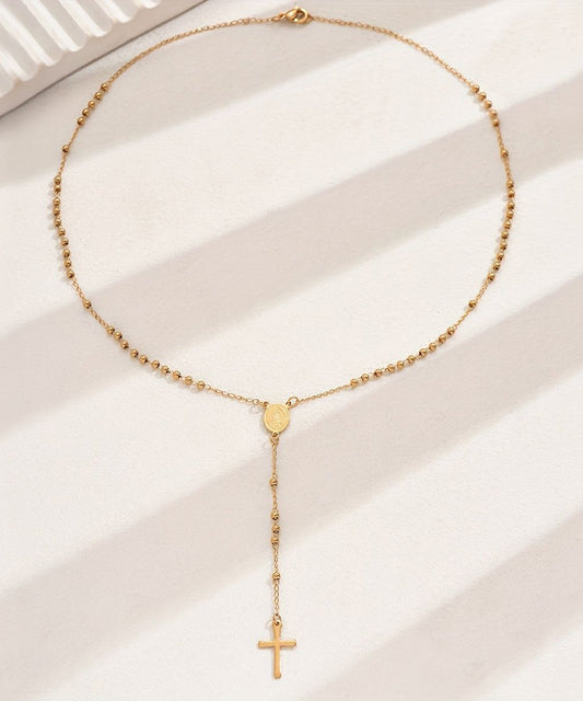 Collar con colgante de cruz de aleación de acero inoxidable y oro boutique