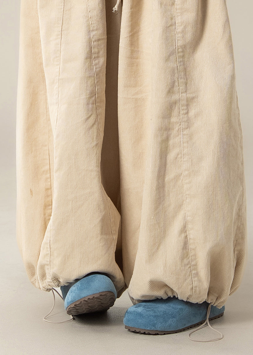 Lässige, aprikosenfarbene Baumwollhose mit hohem Bund und Kordelzug für den Frühling