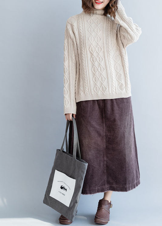 Lässiger hellblauer Rollkragenpullover mit Knopfleiste aus Wolle