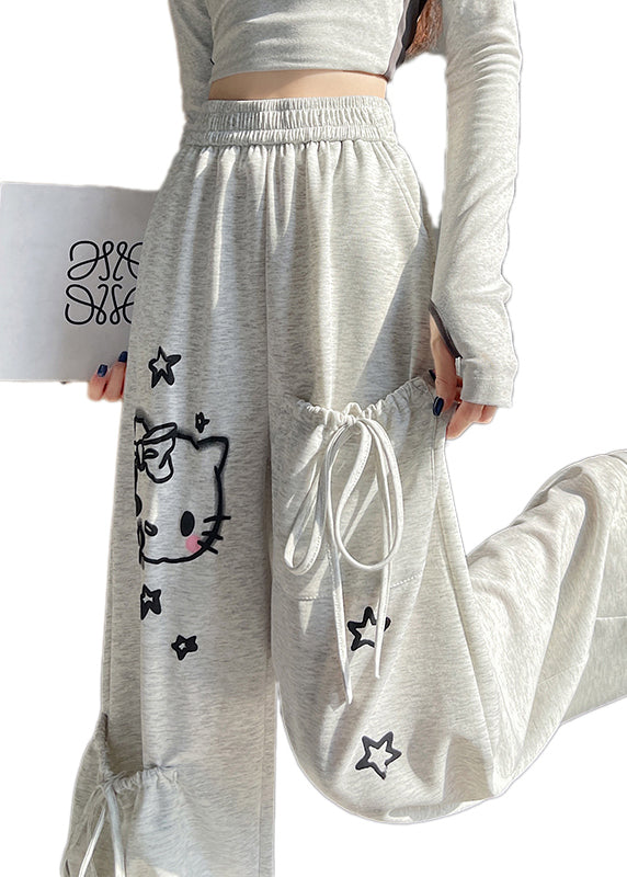 Pantalones casuales de algodón gris claro con cintura elástica y bolsillos estampados para primavera