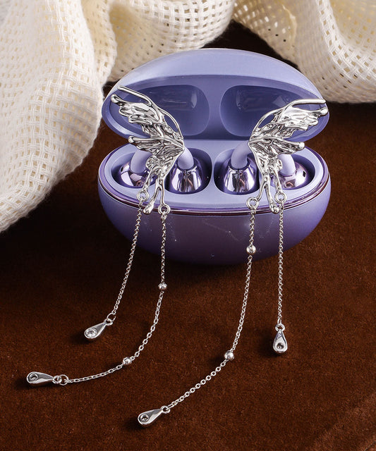 Pendientes casuales con borlas de mariposa de cobre y seda