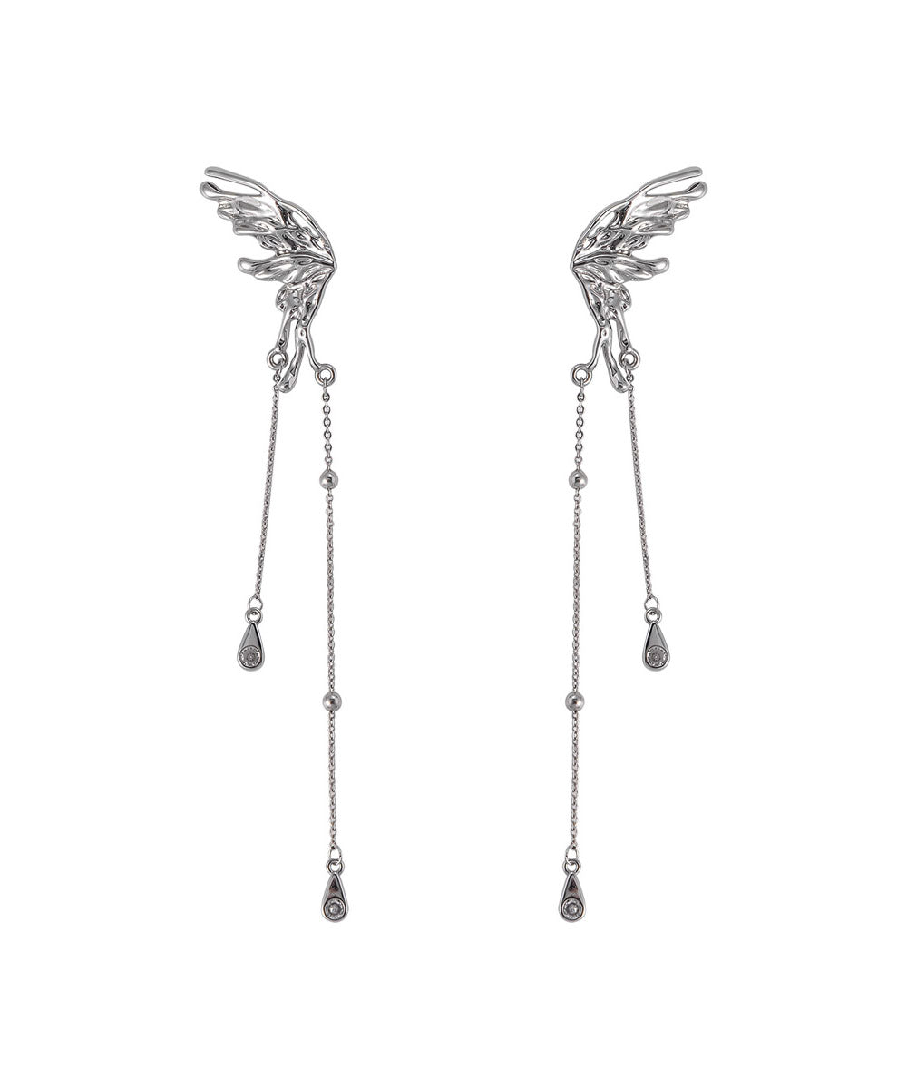 Pendientes casuales con borlas de mariposa de cobre y seda