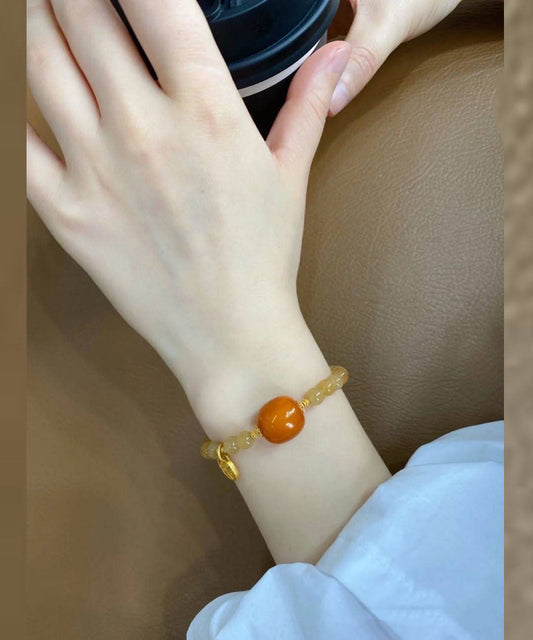 Pulsera elegante de cadena de calcedonia y cera de abejas en oro de 14 quilates con caramelo