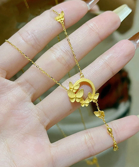Elegante collar con colgante de mariposa y borla de acero inoxidable dorado