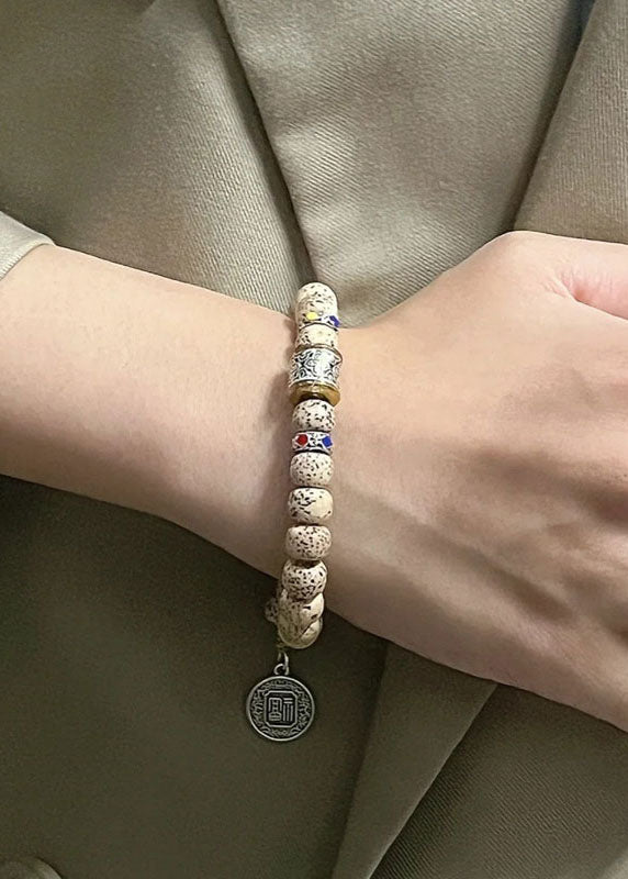 Pulsera elegante con dije de personaje Fu de semilla de árbol Pipal