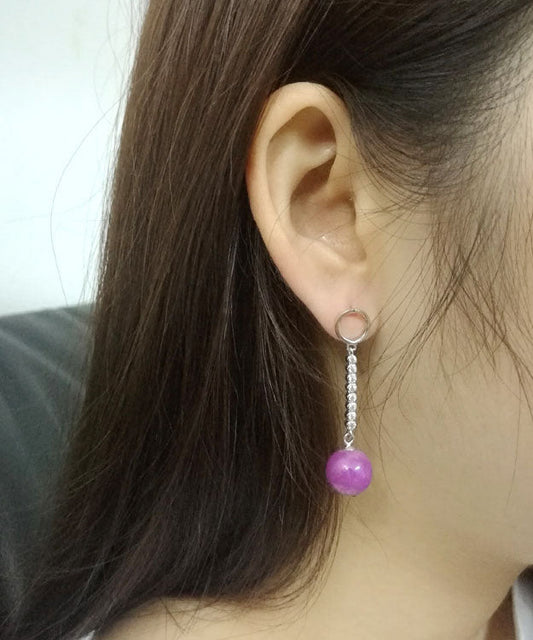 Elegantes pendientes de plata de ley morada con incrustaciones de gemas y circonitas