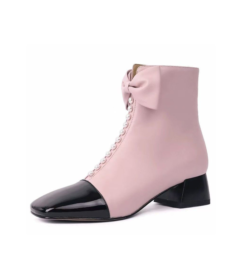 Botas gruesas con cremallera y lazo elegantes de piel de oveja rosa