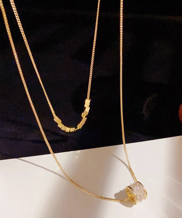 Collar con colgante de doble capa de circonita y acero inoxidable dorado y elegante