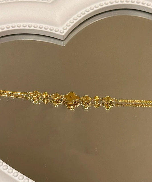 Pulsera elegante con dije de trébol de cuatro hojas y plata de ley dorada