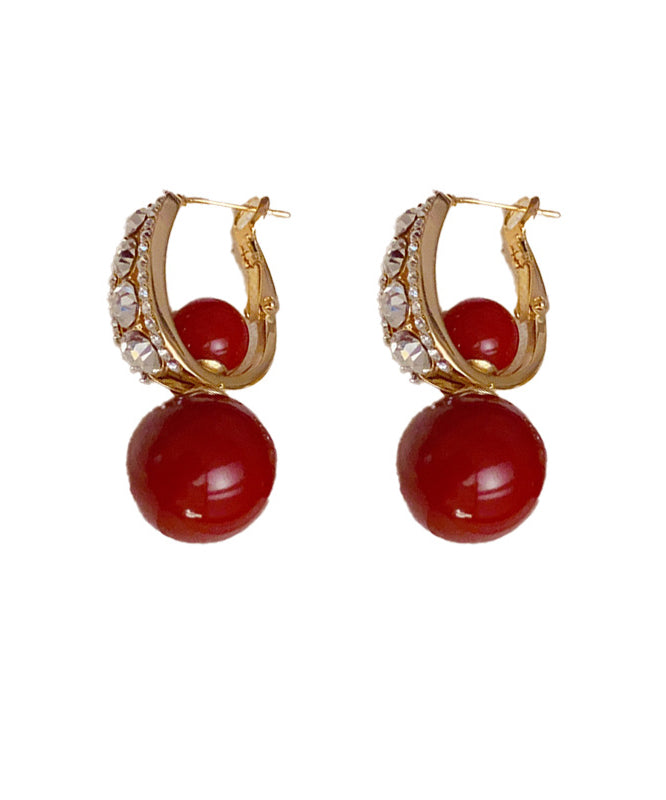 Pendientes elegantes con bola de circonita y perla dorada de cobre rojo