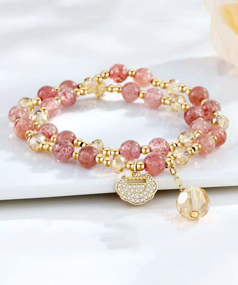 Bonita pulsera con dije de perla de cristal dorado y cobre rojo agua