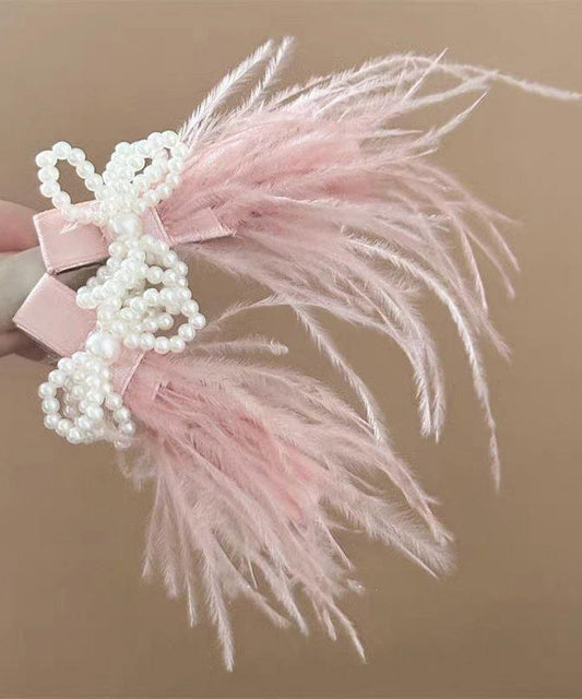 Un par de horquillas para el pelo con plumas de perla de aleación azul