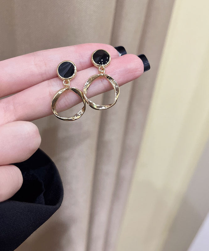 Elegantes pendientes circulares de aleación de plata de ley negra con gotas de aceite.