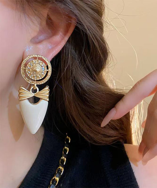 Elegantes pendientes colgantes con lazo de circonitas y aleación de cobre y oro