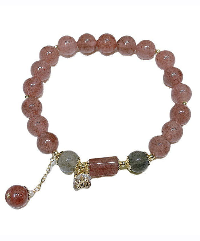 Elegante pulsera con dijes de cuentas de cristal rosa