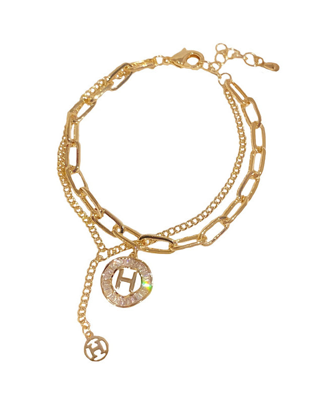 Modisches Charm-Armband mit Quaste und Kristallen in Goldlegierung