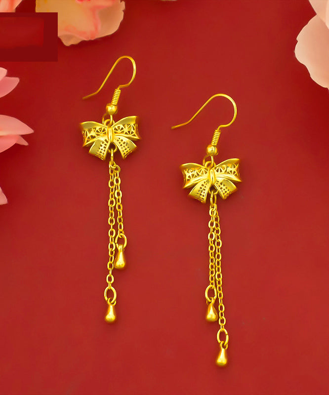 Pendientes colgantes con borlas y lazo de plata de ley dorada a la moda