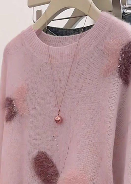 Modischer, rosa Oversize-Strickpullover mit Schmetterlingsmotiv für den Frühling