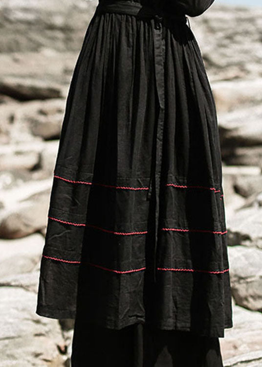 Feines schwarzes, tailliertes Patchwork-Baumwollkleid Frühling