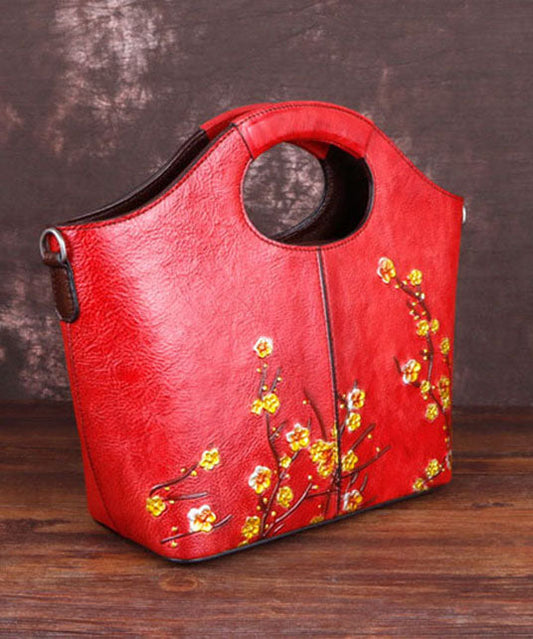 Feine rote Handtasche aus Kalbsleder mit Blumenmuster
