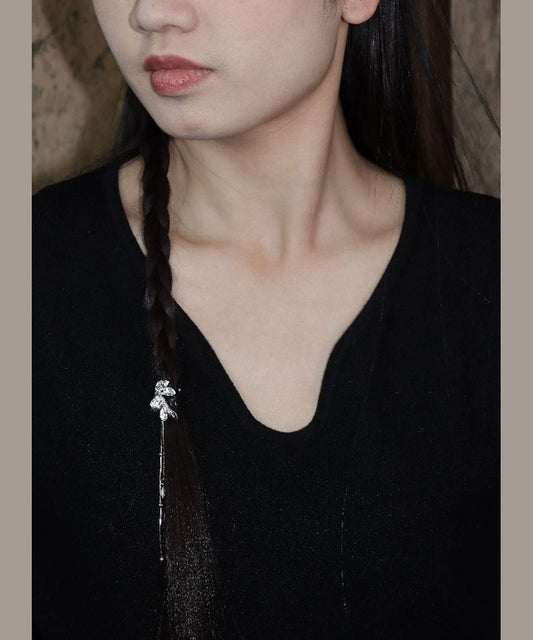 Haarnadel mit Quaste aus feiner Seide und Sterlingsilber in Form einer Zierapfelblüte