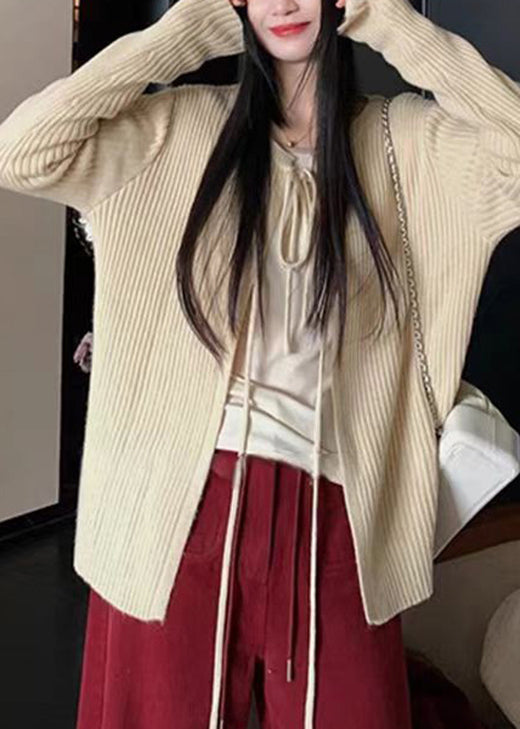 Cárdigan de punto con cuello redondo y cordones en color albaricoque francés para primavera