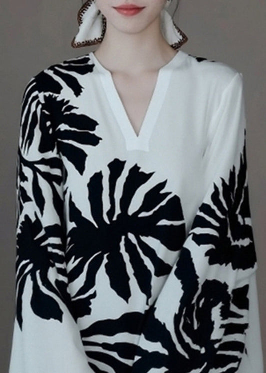 Camisa francesa blanca con estampado arrugado y mangas murciélago