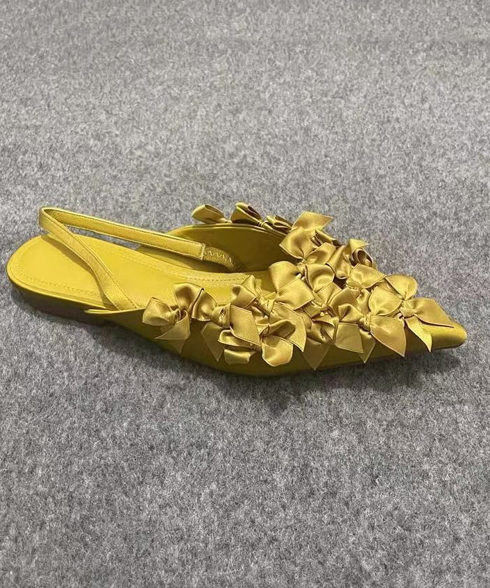 Französische flache Sandalen mit gelber Schleife und spitzer Zehenpartie