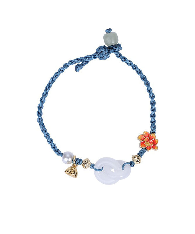 Pulsera de plata de ley azul dorada con dije de perla de jade tejida a mano