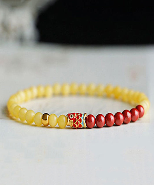 Pulsera de cinabrio con cristales incrustados hecha a mano