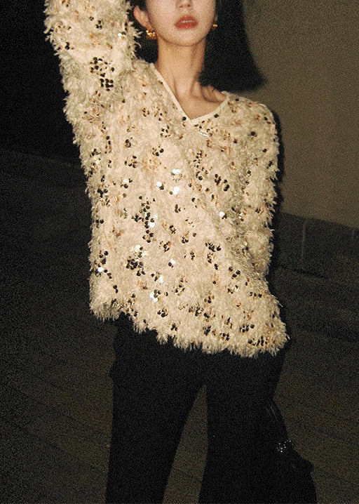 Suéteres de punto con lentejuelas y borlas con cuello en V hechos a mano para invierno