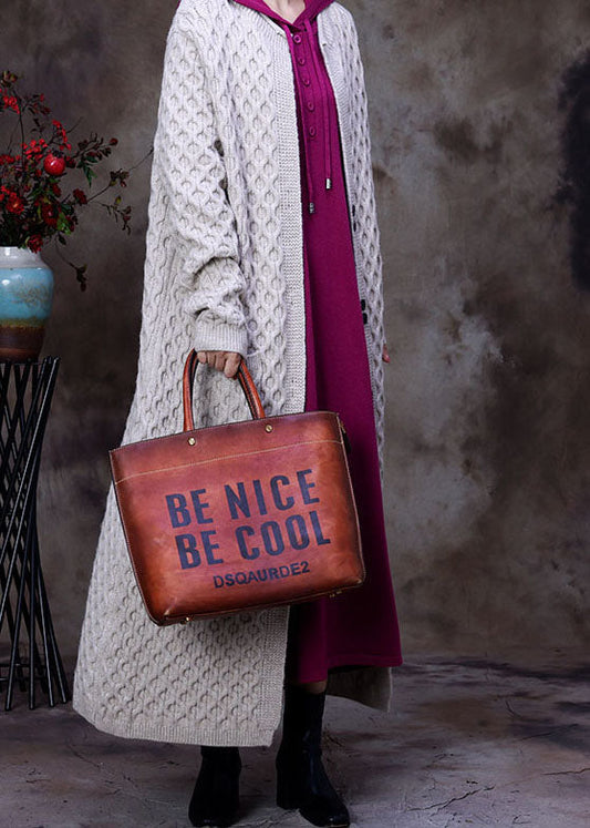 Lockerer Aprikosen-Strickpullover mit Taschen und Knöpfen für den Herbst