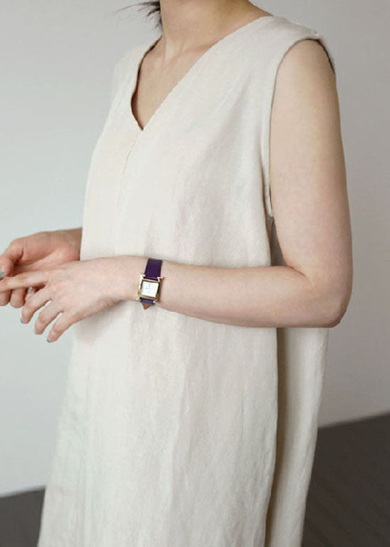 Lockeres, apricotfarbenes, ärmelloses Leinenkleid mit V-Ausschnitt und Taschen