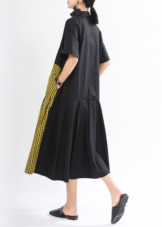 Lockeres schwarzes kariertes Patchwork-Knopf-Herbstkleid mit halben Ärmeln