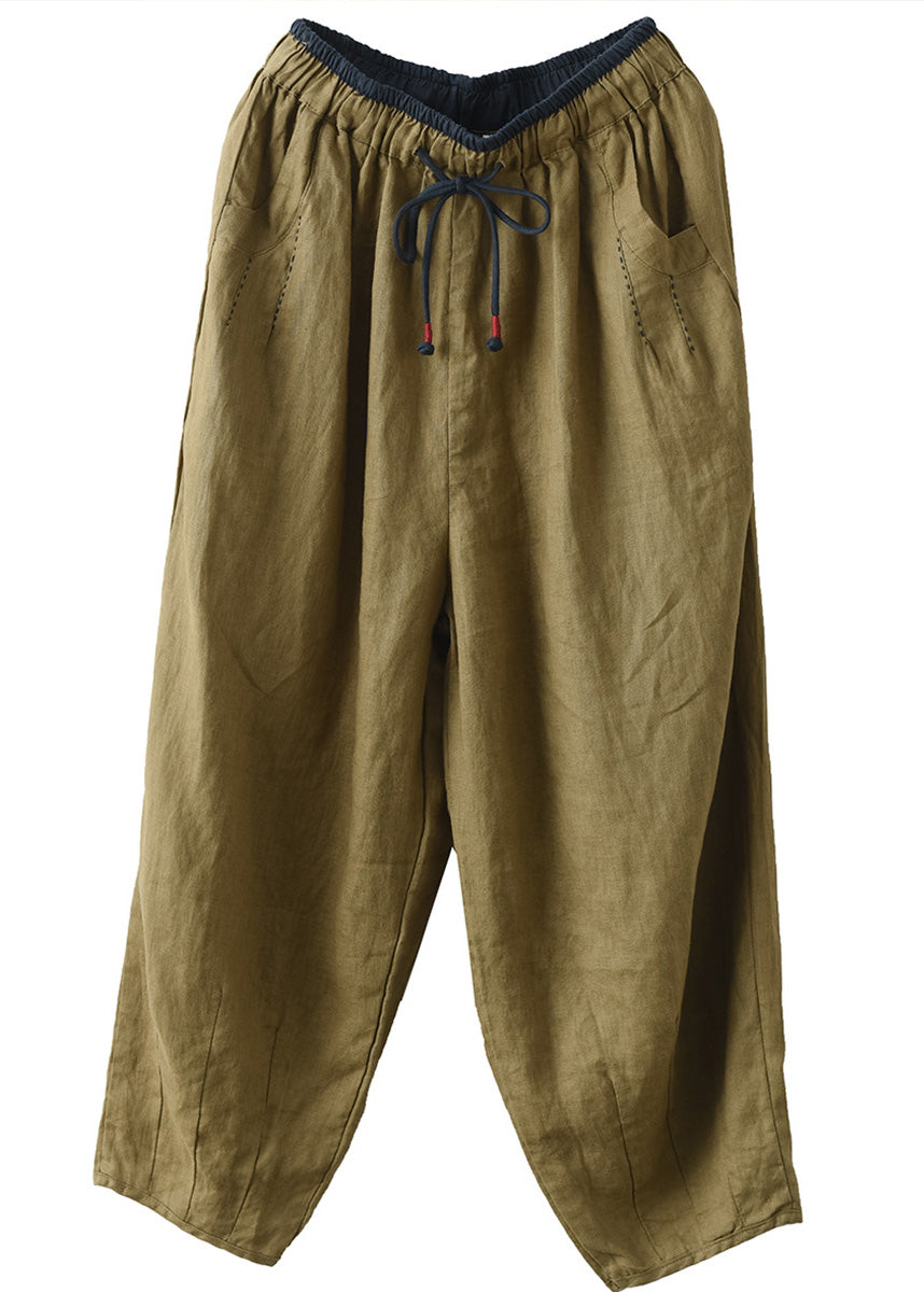 Pantalones anchos de lino con cintura anudada y bolsillos verdes sueltos
